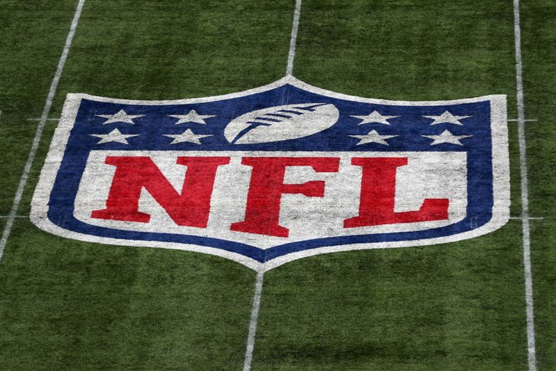 The NFL logo on a football field. The NFL is taking the right steps to fix diversity issues.