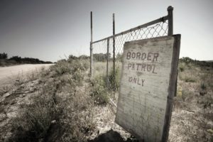 Border patrol sign warning migrants